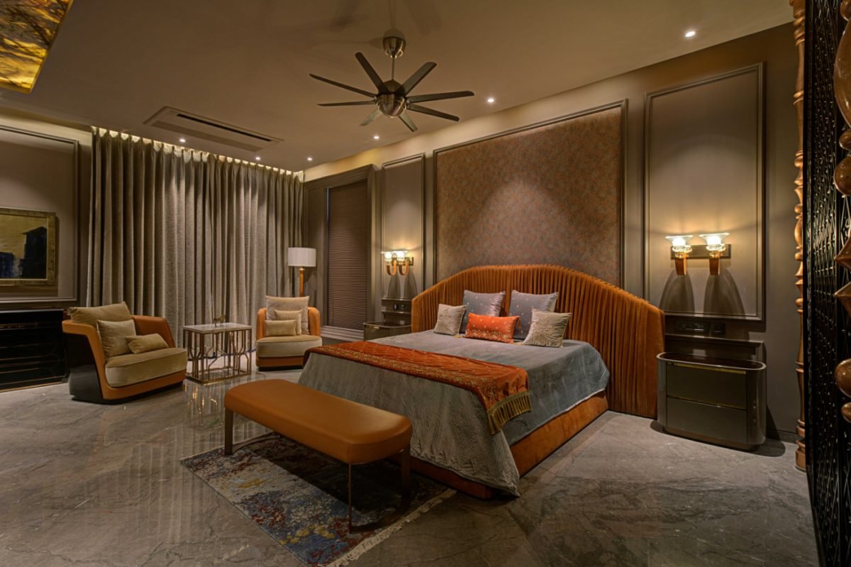 Calm bedroom and wardrobe interior with warm functional detailing